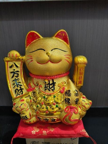 招财猫举左手什么意思，招财猫举左手的意义